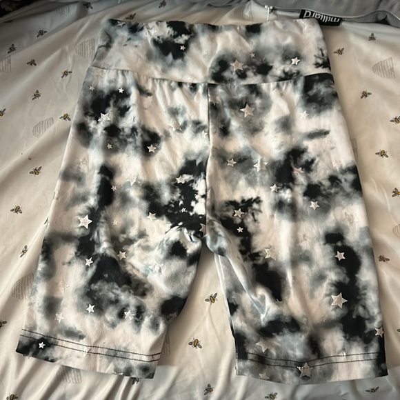 Justice, size xs, and is black white with stars - Picture 2 of 3